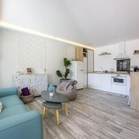 Suite Deluxe En Kharisma Apartment